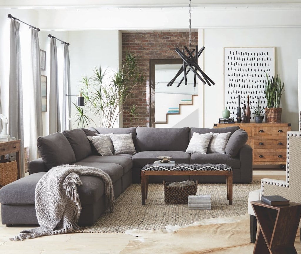 Serene grey cloud modular sectional sofa in a bright living room