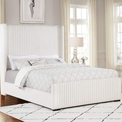 Natasha queen wingback upholstered bed in cream fabric, three-quarter angle view