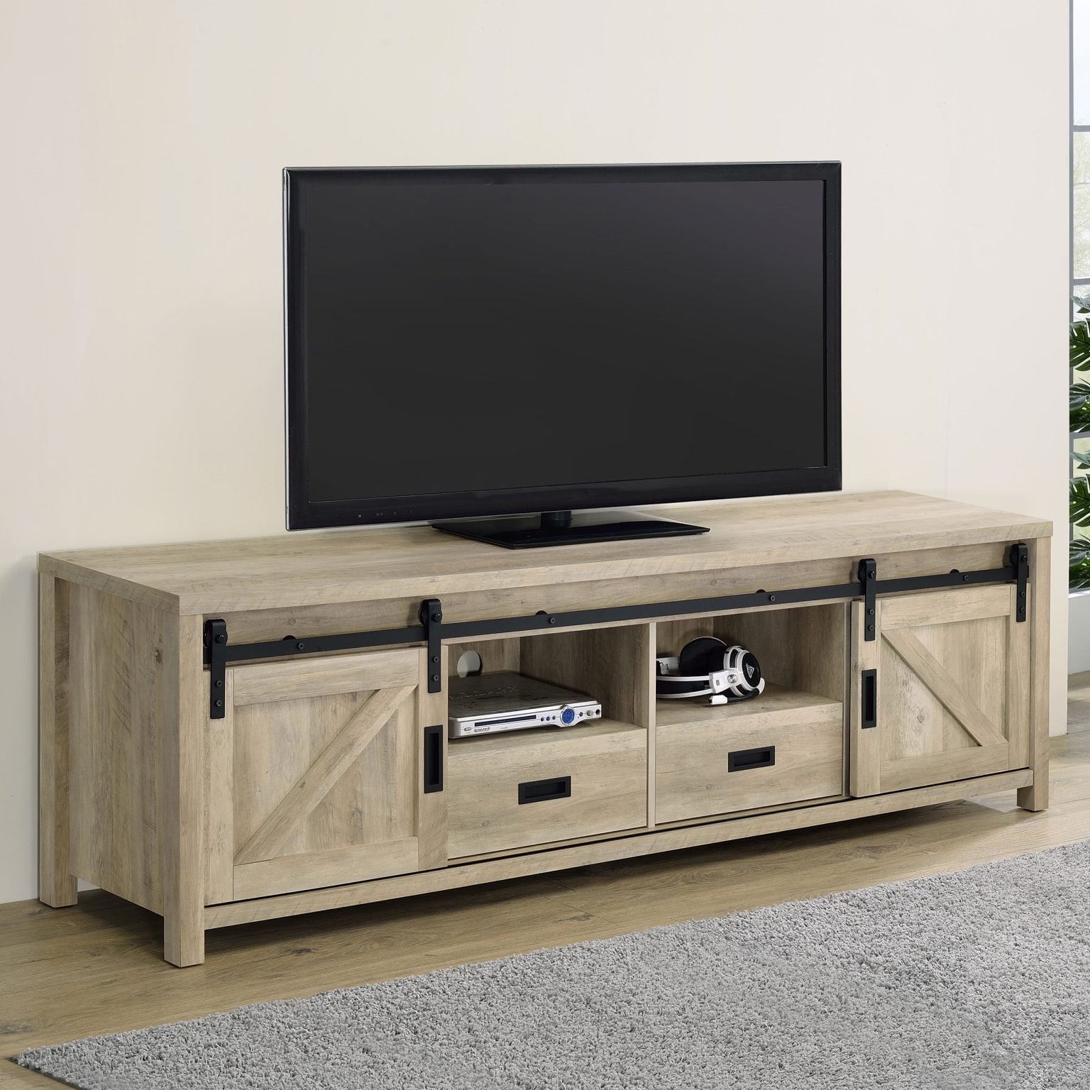 Madra sliding barn door TV stand in distressed pine wood, straight front view