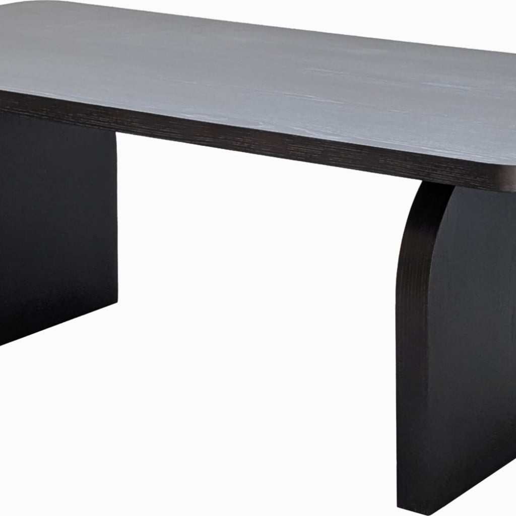 Angled side perspective of modern minimalist dining table