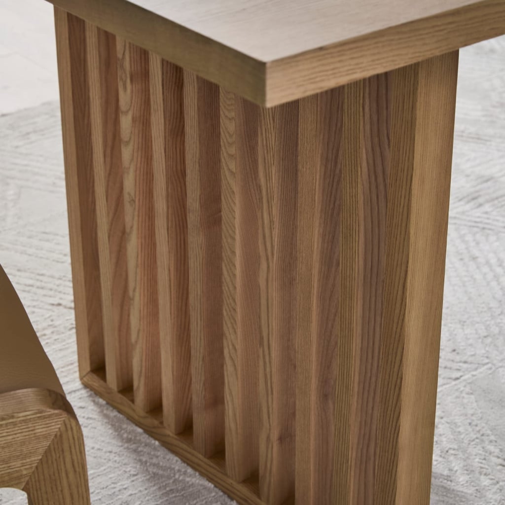 Angled side perspective of modern Flaxen dining table