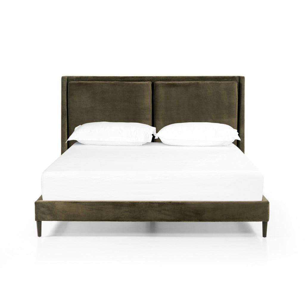 Front view of the Potter king bed in Surrey Olive velvety performance fabric | Three-quarter view of the Potter bed showing the 55-inch cushioned headboard | Side profile of the Potter king bed with tapered solid oak legs | Room scene with the Potter olive upholstered bed in a styled bedroom | Close-up of the Surrey Olive fabric texture with light-play highs and lows | Rear view of the Potter king bed | Detail of the Potter's fixed headboard cushioning | Close-up of the tapered solid oak leg detail