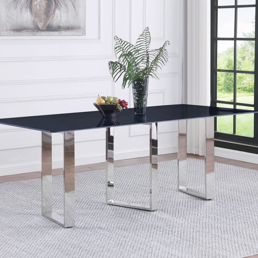 Front view of the Desden 79-inch dining table with grey sintered stone top | Three-quarter view showing the sculpted stainless steel legs | Side profile highlighting the slim contemporary silhouette | Close-up of the grey marble-look sintered stone surface | Detail of the polished stainless leg arrangement | Top-down view of the 79-inch rectangular top | Close-up of the rounded corner detail | Detail of the open-frame leg geometry | Close-up of the stone-to-steel transition | Room scene with the Desden table in a contemporary dining room