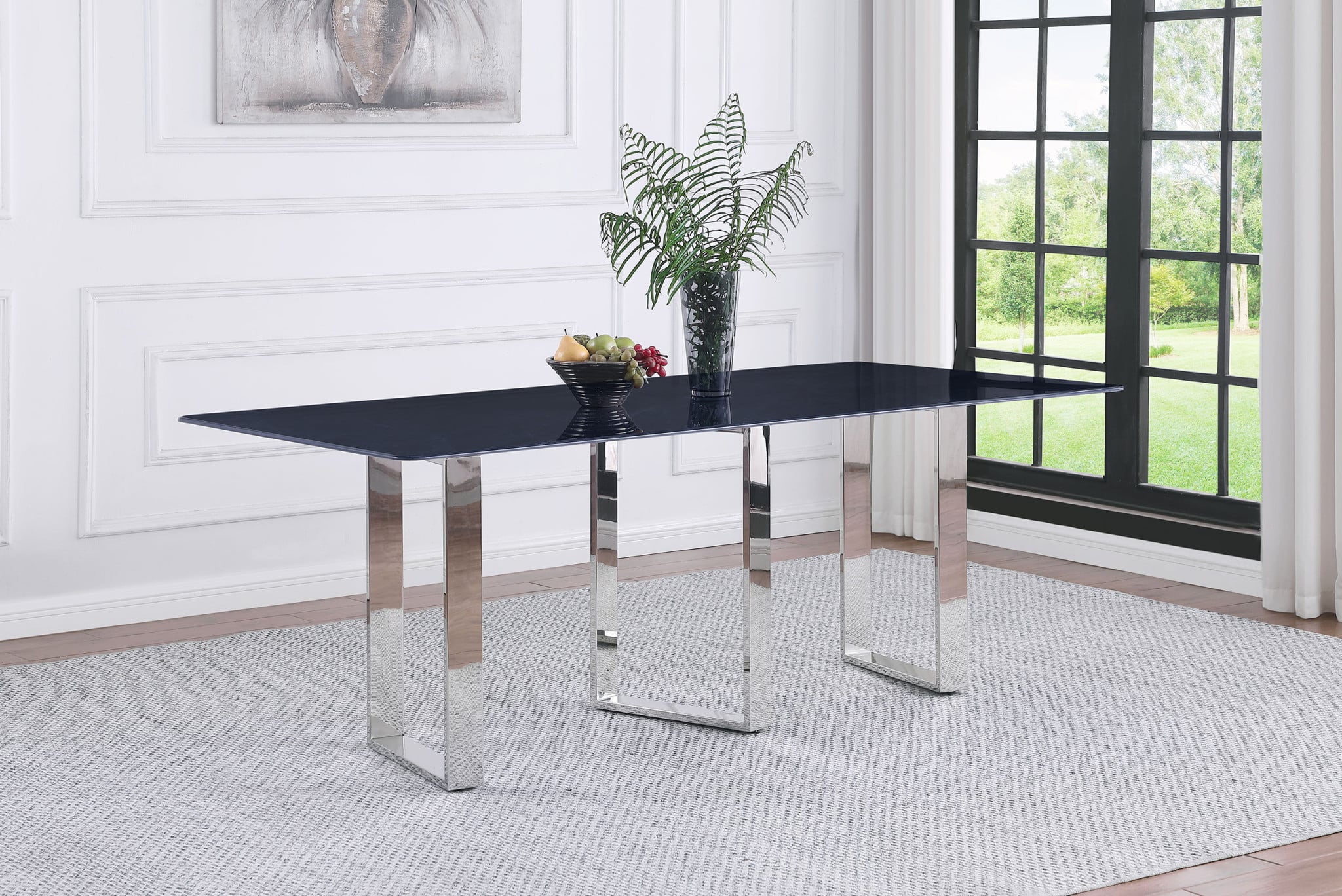 Front view of the Desden 79-inch dining table with grey sintered stone top | Three-quarter view showing the sculpted stainless steel legs | Side profile highlighting the slim contemporary silhouette | Close-up of the grey marble-look sintered stone surface | Detail of the polished stainless leg arrangement | Top-down view of the 79-inch rectangular top | Close-up of the rounded corner detail | Detail of the open-frame leg geometry | Close-up of the stone-to-steel transition | Room scene with the Desden table in a contemporary dining room