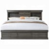 Louis Philippe III Queen Storage Bed in Dark Gray - front view made up with white bedding, showing the bookcase headboard drawers and open compartments above the two-drawer footboard