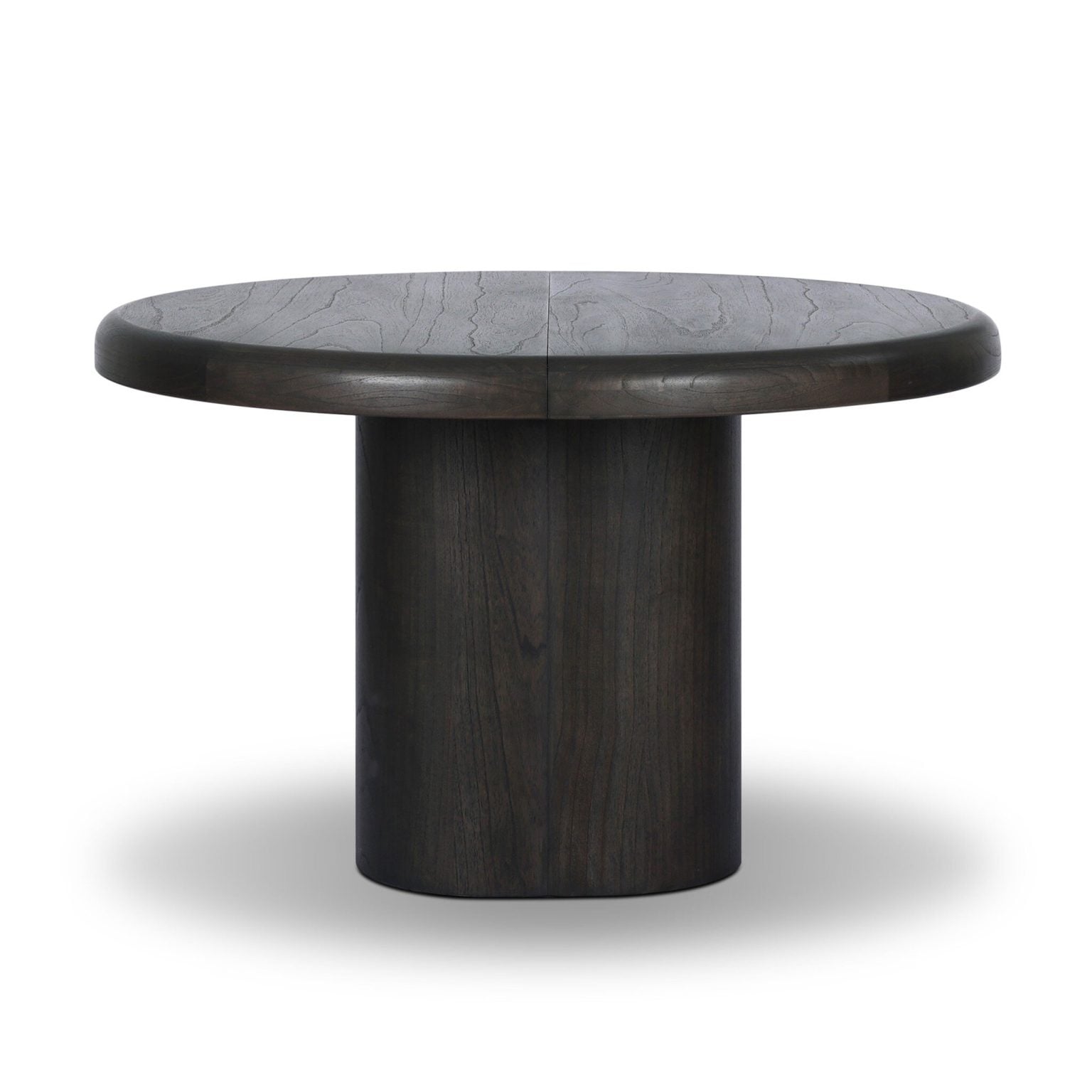Front view of the Pemble 48-inch round extension table in smoked black mindi | Three-quarter view of the Pemble table showing the round profile | Side profile of the Pemble dining table, 30 inches tall | Room scene with the Pemble table in a dining room | Close-up of the smoked black mindi grain | Rear view of the Pemble extension table | Detail of the mindi veneer finish | Close-up of the hidden extension mechanism | Top-down view of the 48-inch round tabletop | Detail of the table edge profile | Close-up of the visible wood graining | Detail of the Pemble's base construction | Close-up of the smoked black finish in natural light | Room scene showing the Pemble table extended to 68 inches | Detail of the extension mechanism in open position | Top-down view of the extended 68-inch surface | Side profile of the extended table | Front view of the Pemble table in extended position | Rear view of the extended table