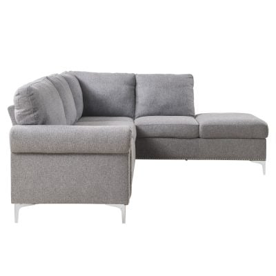 Melvyn grey fabric sectional, rolled arm and nailhead trim close-up