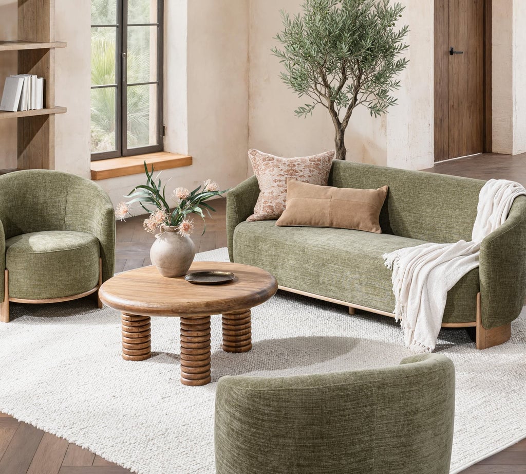 Myra barrel sofa in sage dust green polyester, lifestyle view in a reading corner