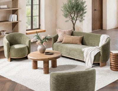 Myra barrel sofa in sage dust green polyester, lifestyle view in a reading corner