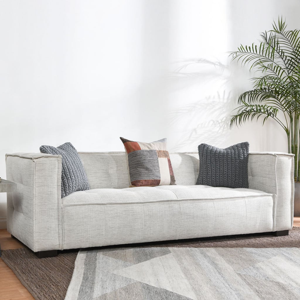 Element beige button-tufted sofa, detail view