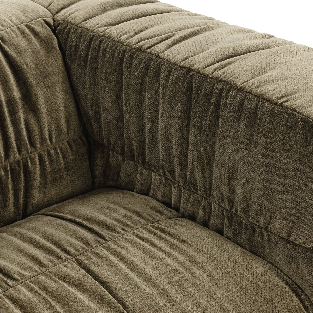 Afeela bench-seat velvet sofa in fern green velvet, close-up of the pleated ruched upholstery