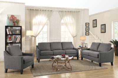 Zapata grey linen sofa with matching loveseat and accent chair in a bright living room