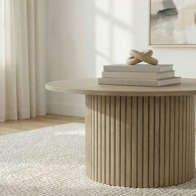 Hamlyn round fluted coffee table in natural oak wood, front view