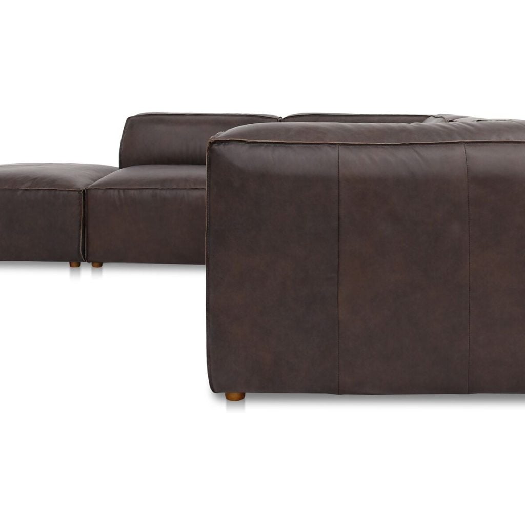 Sonoran Tan leather modular sectional lounge with ottoman angled view