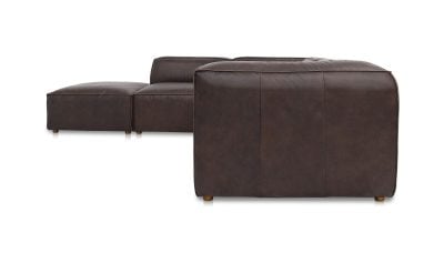 Sonoran Tan leather modular sectional lounge with ottoman angled view
