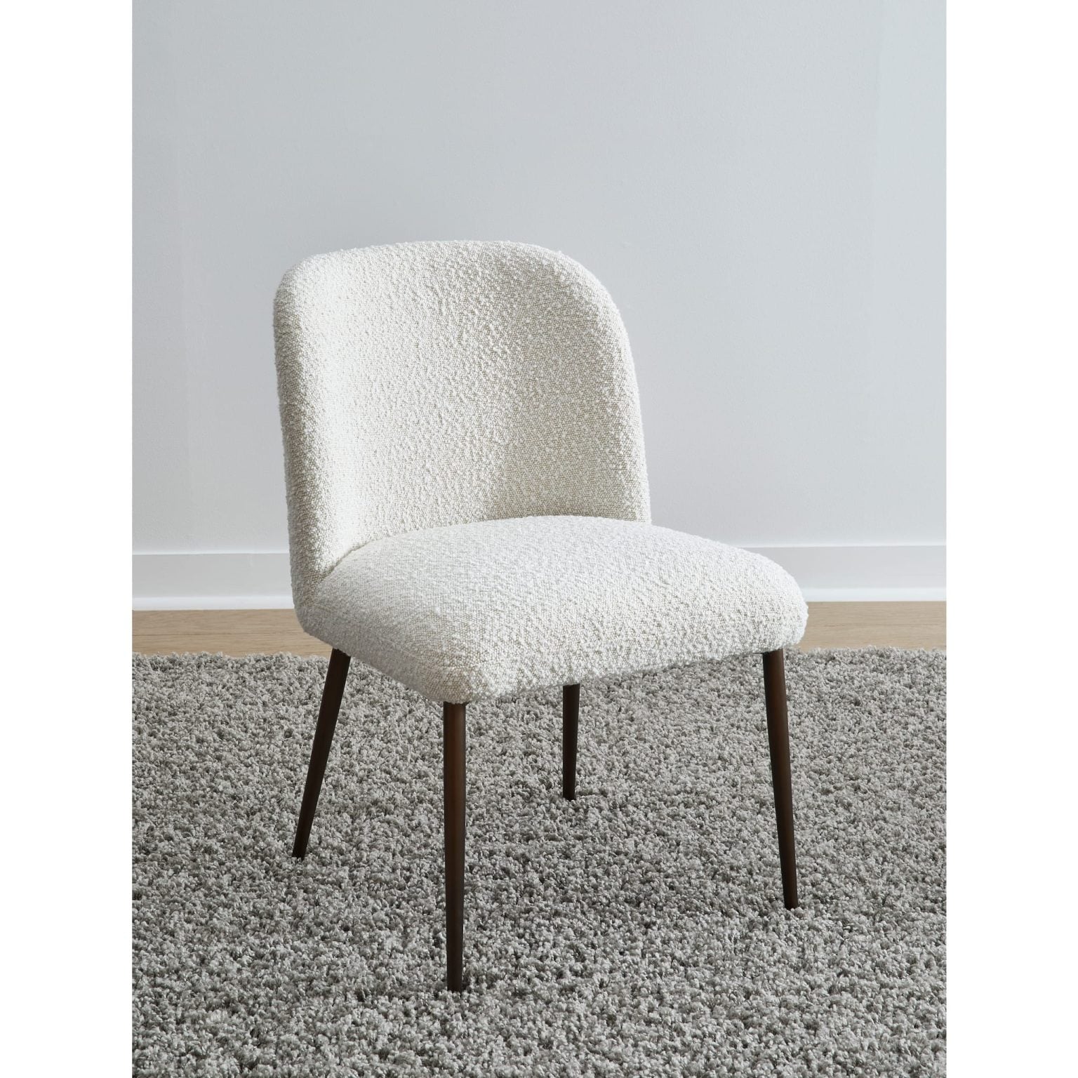 modern ricotta boucle dining chair, Avery front view | Avery dining chair in Ricotta boucle, angled view showing contoured back