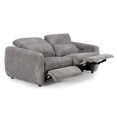 Brevig dual electric reclining sofa in grey polyester fabric, three-quarter view of the adjustable headrest